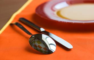 Spoon, knife and plate