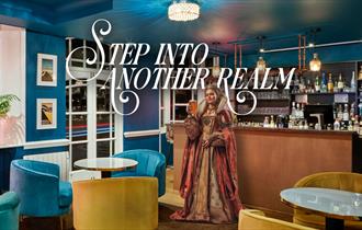 The Royal Adelaide Hotel Bar with person in historic dress holding a pint