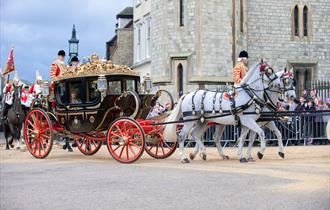 French State Visit to Windsor 2008, image Doug Harding.  Queen Elizabeth II and President Sarkozy ride in a horse-drawn carriage on the Long Walk