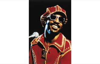 Stevie Wonder in red