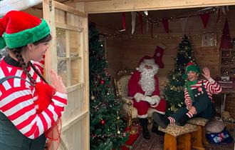 Father Christmas and elves in the grotto