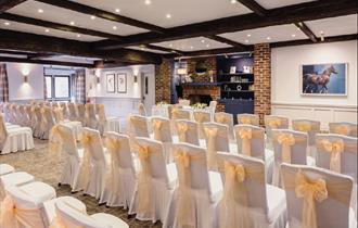 Stirrups Hotel - room decorated for wedding ceremony