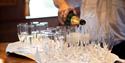 Champagne being poured into glasses