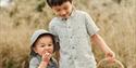 Two children wearing Newbie childrenswear