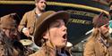 Old Time Sailors - Four singers in traditional sailing garb in front of SS Great Britain