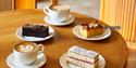 Windsor Castle Undercroft Café coffee and cakes. Credit: © Royal Collection Enterprises Limited 2025 | Royal Collection Trust