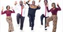 Black Umfolosi dancing hands in the air