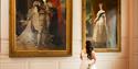 The Windsor Guildhall bride looking at royal portraits