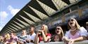 Image of adults and children enjoying the racing at Ascot Racecourse