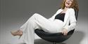 Joanna MacGregor - Sat in chair laughing