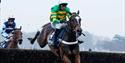 Jonbon jumps a steeplechase fence at Ascot