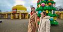 LEGOLAND at Christmas | people walking past LEGO Christmas tree