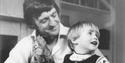 Black and white photo of Michael Parkinson and son Mike