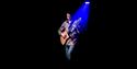 Nicolas Meier playing guitar under a blue spotlight ©Eric Humair