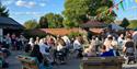 Norden Farm Night Market Aug 2025 - people in the summer market