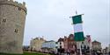 Windsor Castle with Union flag and Nigerian flag, image VisitWindsor