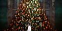 Royal Ballet and Opera The Nutcracker - production shot, dancer in front of a Christmas tree