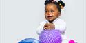 Soft or Spiky - Young girl playing with toys and cloth - ©Steve Gregson