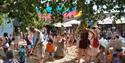 Children, adults and families enjoying the Maidenhead Beach at Norden Farm