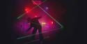 Silhouetted person navigates green laser beams in a dark, smoky room lit by red and purple lights, creating a mysterious, tense atmosphere.