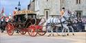 French State Visit to Windsor 2008, image Doug Harding.  Queen Elizabeth II and President Sarkozy ride in a horse-drawn carriage on the Long Walk