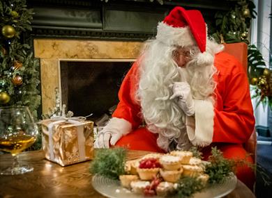 Santa with mince pies at The Castle Hotel Windsor