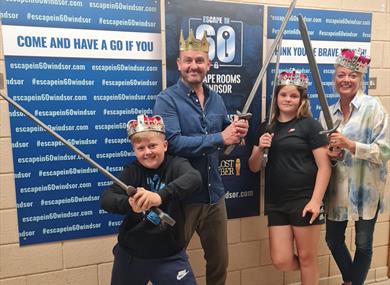 People taking part in Escape in 60 Escape Room
