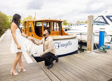 Two people getting engaged by Fringilla