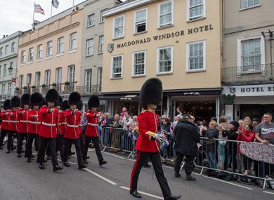 Guards marching past Macdonald Windsor Hotel