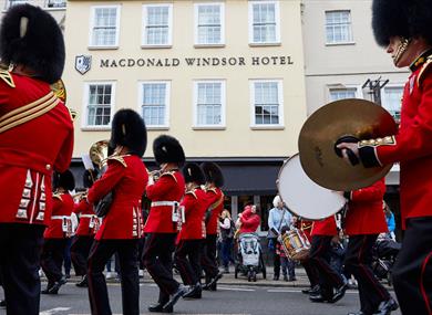 Guards marching past Macdonald Windsor Hotel