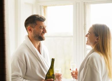 Two people in dressing gowns