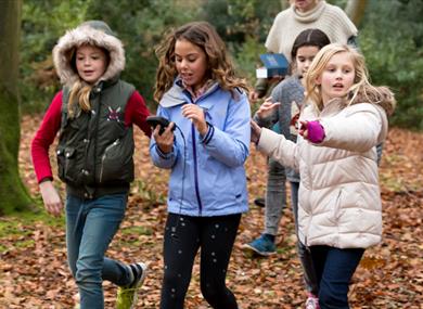 Children walking on a trail at The Langley