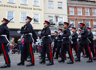 Guards marching past Macdonald Windsor Hotel