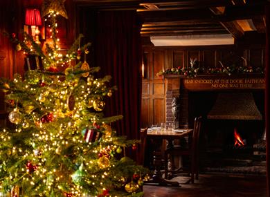 Christmas tree by the fire at The Hind's Head