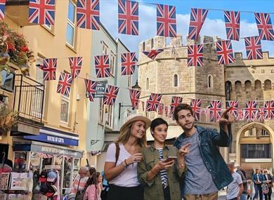 People standing in front of Windsor Castle