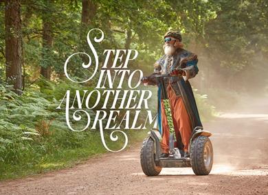 Step into another realm | person on a segway at Go Ape