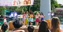 Crowd watching a performance of Lego friends at LEGOLAND Windsor