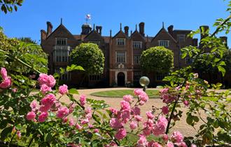 Exterior of Great Fosters in summertime