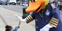 Girl gives the Windsor Duck a 'high five'