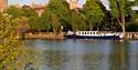 Magna Carta Luxury Hotel Barge with Windsor Castle in distance