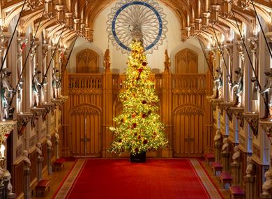 Windsor Castle | The 20-foot-high Nordmann Fir Christmas tree in St George’s Hall. Royal Collection Trust / © His Majesty King Charles III 2023. 