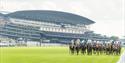 Ascot Racecourse flat race meeting with grandstand in background