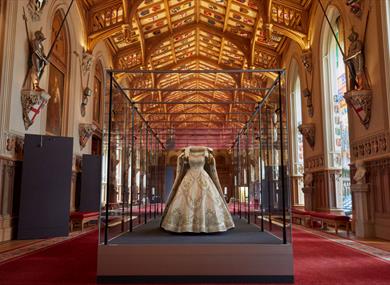 Her Majesty The Queen’s Coronation Dress and Robe of Estate in St George’s Hall.  Royal Collection Trust / All Rights Reserved.