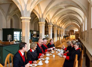 Windsor Castle wardens sample the menu at the Undercroft Cafe.  Royal Collection Trust / © Her Majesty Queen Elizabeth II