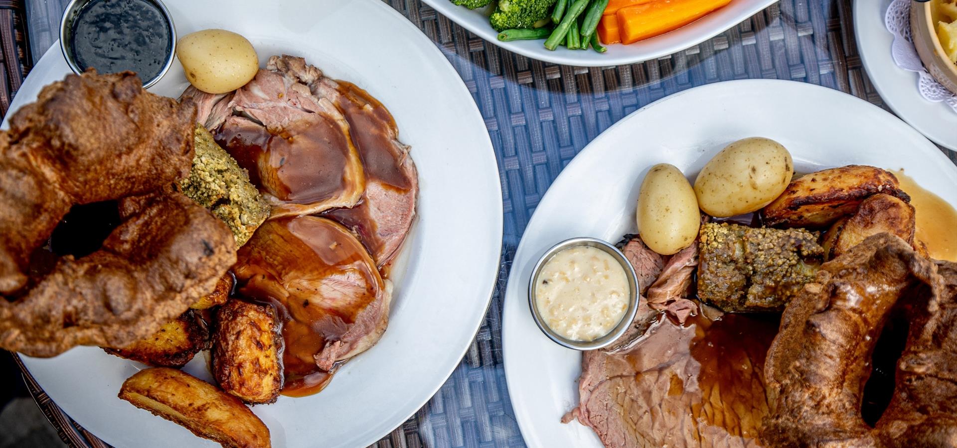 An image of a roast dinner with Yorkshire Puddings by Charlotte Graham