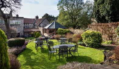 An image of The Black Swan Hotel - Garden and seating