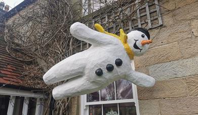 An image of a Snowman model as part of the Snowman trail at Danby Lodge.