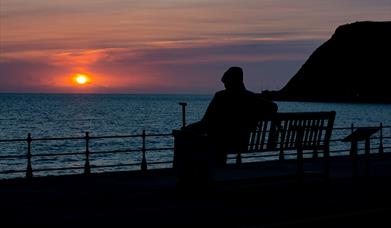 An image of Freddie Gilroy Sculpture at Sunset