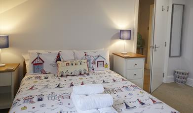 An image of a bed at Fermain Apartment - 5 Leys