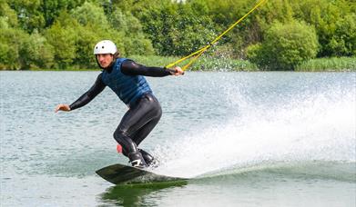 An image of a man bodyboarding